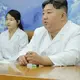 North Korea shows Kim Jong Un examining a military spy satellite that may be launched soon