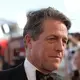 Court says Hugh Grant's lawsuit alleging illegal snooping by The Sun tabloid can go to trial