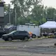 Parking lot party shooting leaves 1 dead and 22 people hurt in suburban Chicago