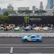 Heavy rains flood Chicago roads and force NASCAR to cut short a downtown street race