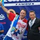 Joey Chestnut wins 16th hot dog eating contest after storm delays event