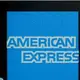 American Express profit rises, but it sets aside more money for possible defaults