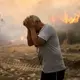As wildfires sweep through Greece, resident returns home to find it 'all gone, totally gone'