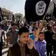 The Islamic State group says its leader was killed by militants in Syria and names his successor