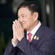 Thailand's king reduces former Prime Minister Thaksin's 8-year prison term to a single year