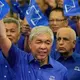 Malaysian court dismisses dozens of graft charges against deputy prime minister