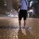 Rain floods Hong Kong streets and subway stations