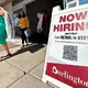 US applications for unemployment benefits fall to lowest level in 7 months