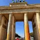 Climate activists spray Berlin's Brandenburg Gate with orange paint