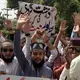 Death toll from Pakistan bombing rises to 54 as suspicion falls on local Islamic State group chapter