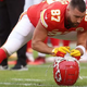 Why does Travis Kelce wear number 87 for the Kansas City Chiefs?