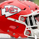 Why do the Kansas City Chiefs wear the color red? What is the origin of their logo?