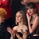 Taylor Swift surprises as she chugs a beer on the jumbotron at Super Bowl 2024