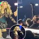 Madonna falls backwards in her chair during Seattle concert