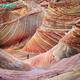 Exploring The Wave in Arizona, USA: A Natural Wonder of Striking Beauty, Nestled in the heart of the American Southwest, “The Wave” is a geological marvel and a testament to the captivating beauty that nature can carve over time