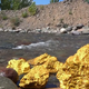 kem.Exciting Discovery: Giant gold nuggets and ruby-like gemstones found beneath an untouched stream.