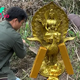 kem.Lucky find! The man was overjoyed to discover a solid gold statue of Quan Yin riding a phoenix.