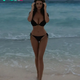 Cristy Ren is seductive with beautiful features in a magical black swimsuit