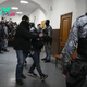 Russia Concert Hall Attack Suspects Appear, Beaten, Before Moscow Court. Two Plead Guilty