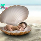 Adorable infant dozing in a seashell