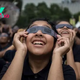 What should you do with your used solar eclipse glasses?