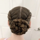 Gorgeous glittering braided hairstyles for your daughter’s special day.