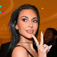 Kim Kardashian Flashes Peace Sign Outside White House Event 