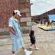 rr Liverpool star Luis Diaz embodies greatness as he enjoys a serene day, strolling alongside his wife and daughter, exemplifying the essence of fatherhood.