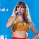 Taylor Swift Wears Chiefs Colors and Addresses 87th Eras Tour Show With Travis in Crowd