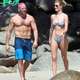 tl.Rosie Huntington-Whiteley showcases supermodel-slim bikini body in printed two-piece while Jason Statham unveils sculpted torso on romantic break in Thailand