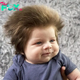 The 2-month-old baby has hair as thick as a lion’s mane, attracting everyone’s attention because it is so outstanding and cute.