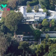 b83.Travis Kelce and Taylor Swift’s love nest: Aerial images of the singer’s $25 million Beverly Hills mansion show it makes the perfect hideaway for the power couple as they finally enjoy some downtime together.