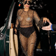 rin Lady Gaga in fishnets at her party in New York, but the attention is on her thong