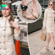 Anna Delvey ‘models’ custom designed Shao New York look, complete with bedazzled ankle monitor, for immigration hearing