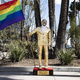 B83.Golden Statue of Kevin Hart with Rainbow Flag Emerges Near Oscars Venue Amid Controversy