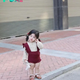 Let’s look at the adorable little girl on the street