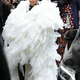 rin Cardi B embodies Haute Couture as she heads to Balenciaga’s Paris Fashion Week show in a dramatic white ruffle cape