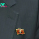 North Koreans Are Now Wearing Kim Jong Un Pins as His Personality Cult Grows
