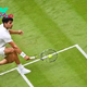 Why do they play on a grass surface at Wimbledon?