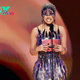 rin Cardi B Dazzles in a Stunning 3D Wave Dress, Reminiscent of a Golden Grammy Trumpet