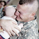 The soldier looked so happy to see his wife and children again after many days of separation. Happy smile, teary eyes when he held his first child for the first time because he had to go on duty.