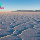 Salar de Uyuni: The world's largest salt desert and lithium reservoir surrounded by volcanoes