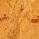 9,000-year-old rock art of people swimming in what's now the arid Sahara