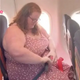 Woman tries to take her seat on a plane, but she refuses, and what happens next has the internet is divided