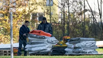 In asylum dispute, Austrian mayor takes down migrant tents