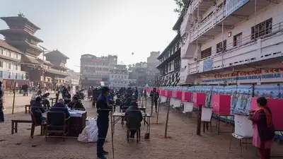 Voters in Nepal line up to elect new members of Parliament