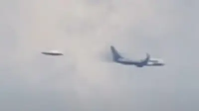 Clear UFO Hiding Behind Cloud’s Zooms Off When Aeroplane Passes It