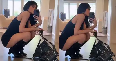 Kylie Jenner is a modern femme fatale in a skintight LBD and boots