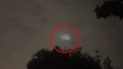 Notice the blinking lights in Melbourne’s cloudy night sky? There’s a simple explanation