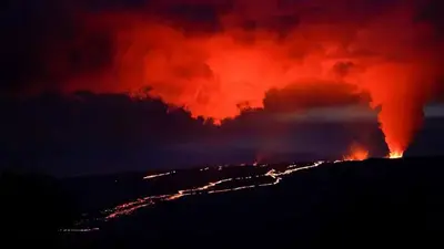 Lava oozing out of Mauna Loa inching closer to main highway on Hawaii's Big Island